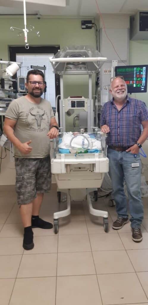 Successful surgery for Gabriel, a baby with heart defects, was performed by Dr. Mishaly (right)